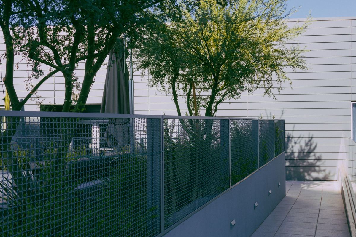 Modern aluminum patio fence in Mass Ave